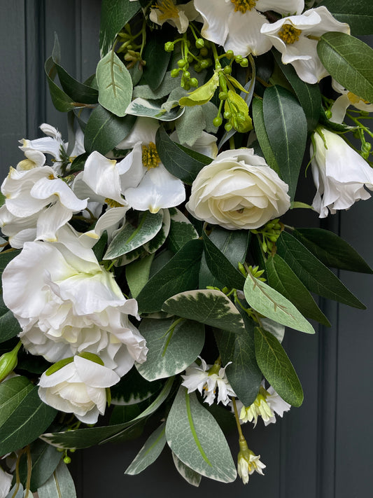 White & Green Dogwood, Ranunculus, and Eucalyptus Wreath