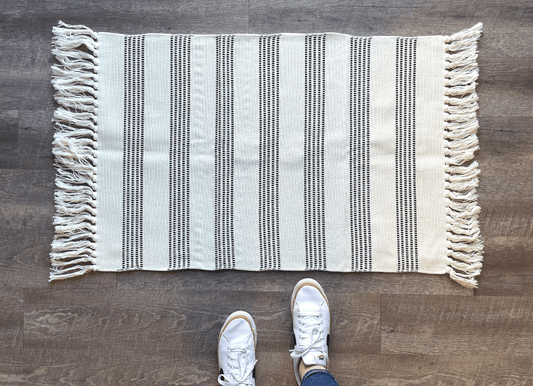 Black and White Striped Accent Rug With Fringe