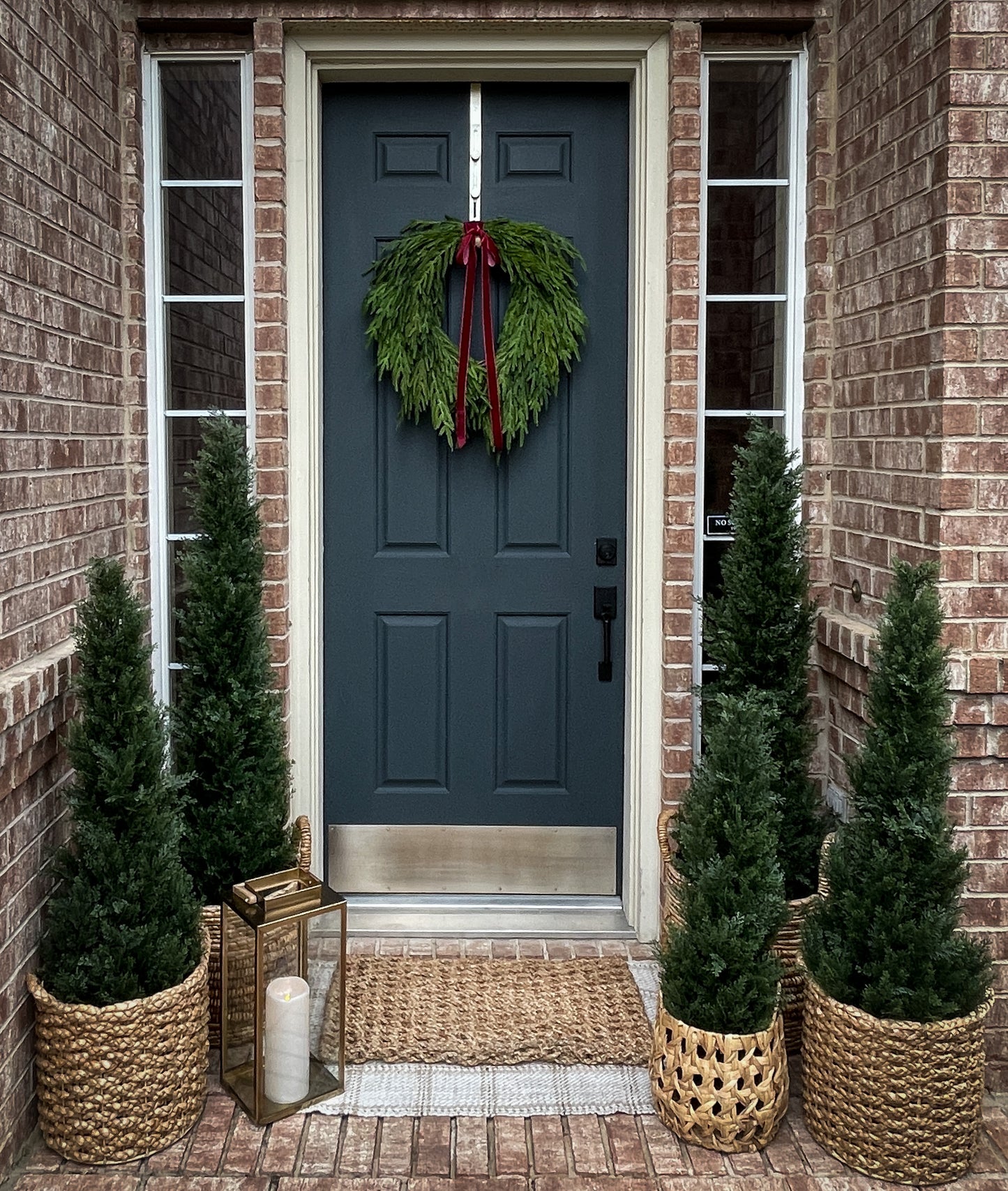 Faux Norfolk Pine Wreath with Red Velvet Bow