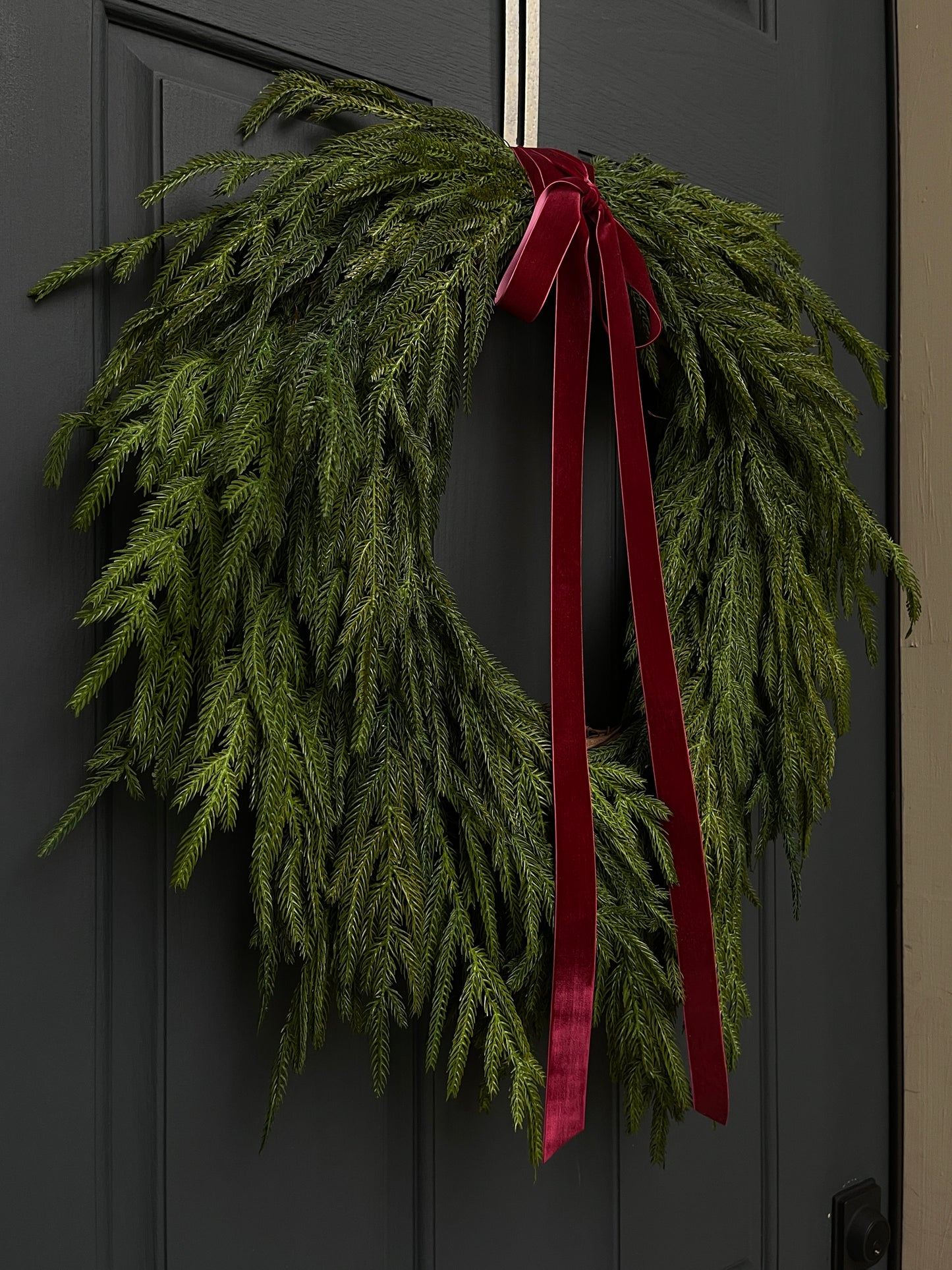 Faux Norfolk Pine Wreath with Red Velvet Bow