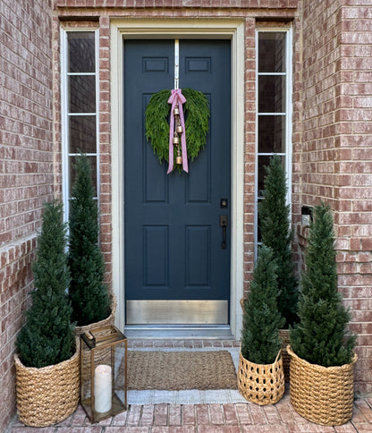 Faux Norfolk Pine Wreath with Bells and Red & White Striped Bow