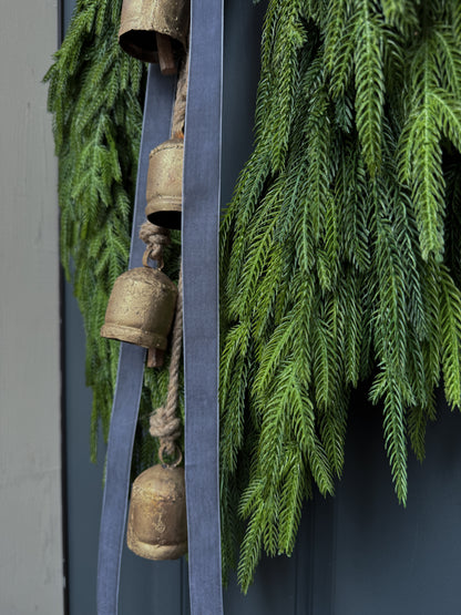 Faux Norfolk Pine Wreath with Bells and Red & White Striped Bow