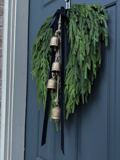 Faux Norfolk Pine Wreath with Bells and Red & White Striped Bow