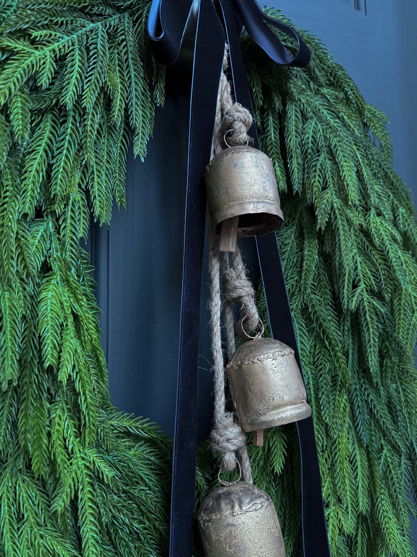 Faux Norfolk Pine Wreath with Bells & Navy Blue Velvet Bow