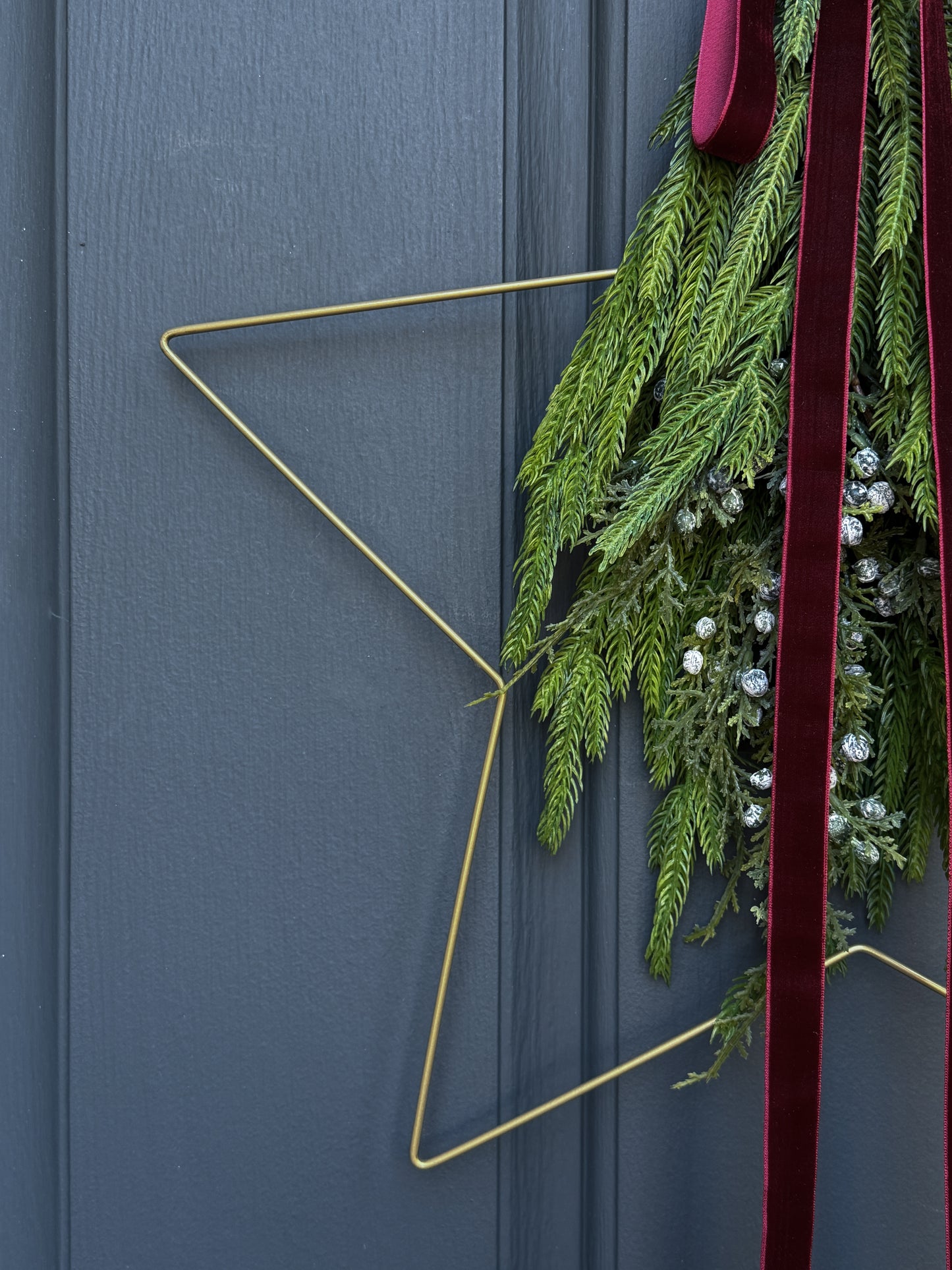 Modern Star Wreath with Greenery and Red Velvet Ribbon