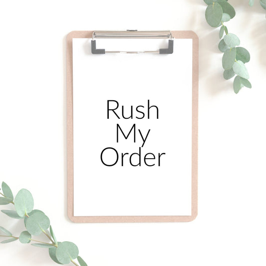 Image of a clip board with a piece of white paper that says rush my order.